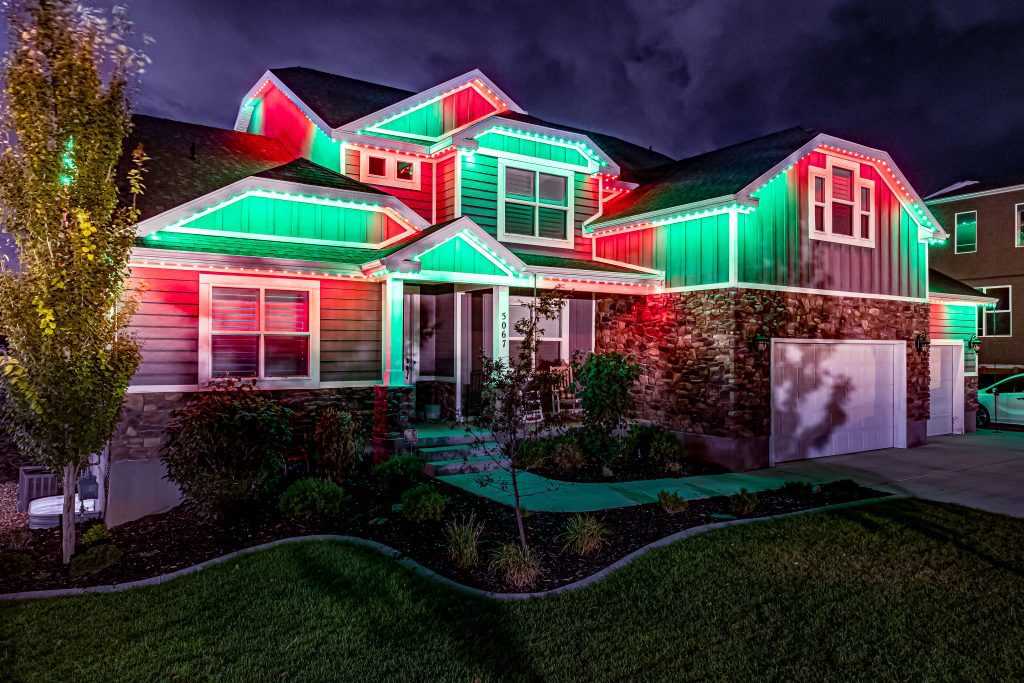 Trimlight Christmas Green and Red Outdoor Lights Permanent holiday lights in classic green and red.